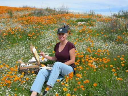 Joanne Painting in the Poppy field