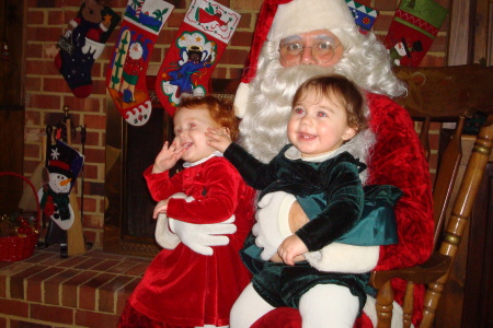 Santa (I) and my Grandaughters Dec 2008