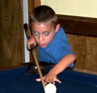 Aiden playing pool.