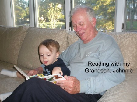Reading with grandson, Johnnie
