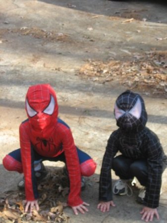 Jordyn and Logan playing spider man