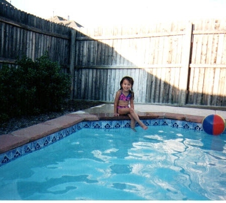 Breanna swimming at home.