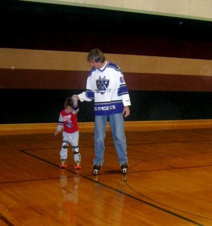 My first time on skates with my coach and son