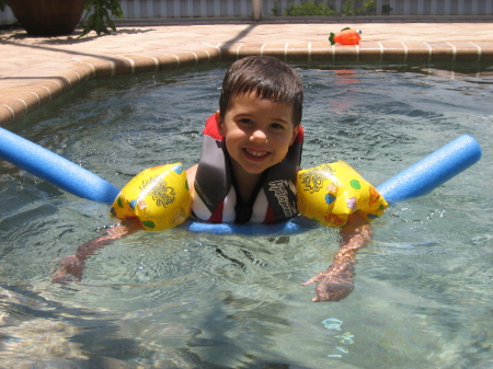 Grandson Jacob swimming in our pool in Florida