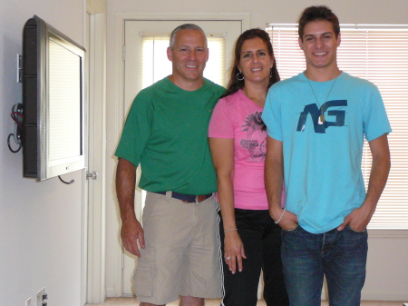 Tom, Annette and Tommy in his college crib.