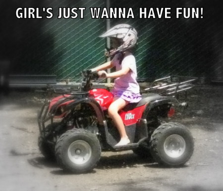 Kathryn riding ATV