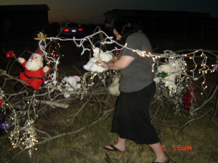 Candice checking on bunny in Christmas Limb