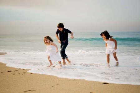 My little ones playing in the surf