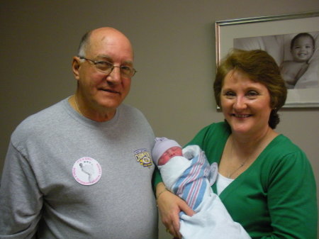Bobbie and I with Julianne our 10th Grandchild