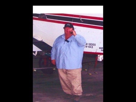 Jim Standing in front of his plane