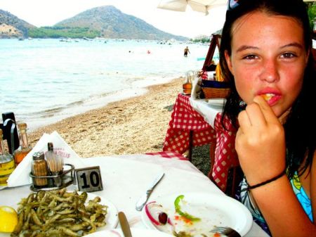 Paloma chowing on Greek Mezzes in Tolo