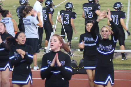 sami cheering at high school game