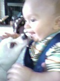 Liam (at 5 months) with little doggie Augie