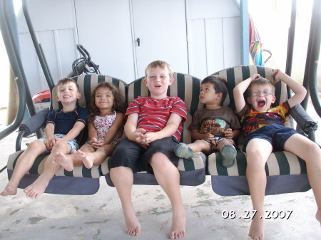 All the grandkids on the swing - August 2007