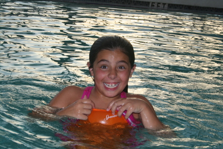 Alicia loves the pool........morning to night!