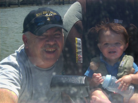 Kamden and Pop out on the boat