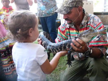 kayden holding an alligator