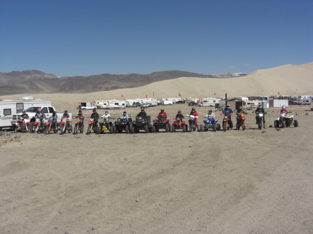 lineup of friends ready for a long desert ride