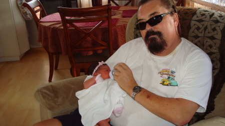Holding 2-Week Old Grand-Daughter