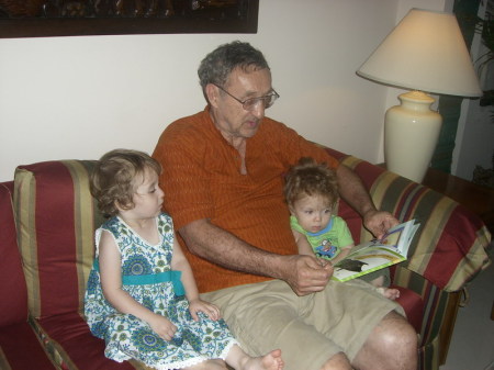 Grandpa reading to Aviva and Zak