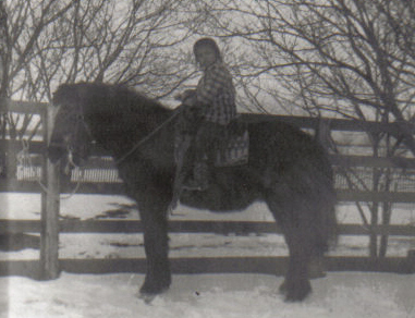 Sister Cindy taking Buddy for a spin.