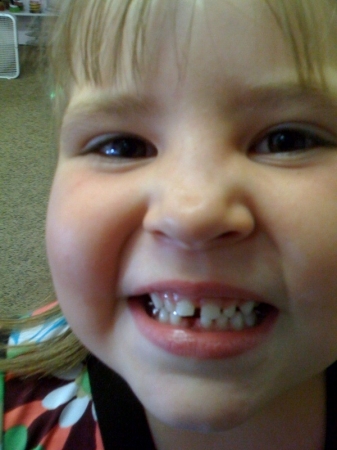 Morgan's first tooth out