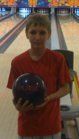 Zack (12  years old) at bowling alley