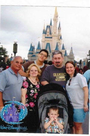 Our son (tallest) with our daughter & grandson