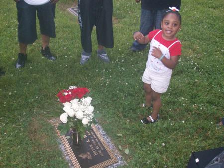 Grand daughter at daddy's grave site