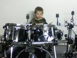 My grandson beating the drums