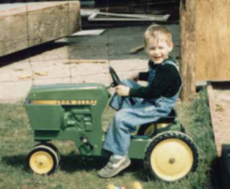 OK, he started a little young pullin tractors!