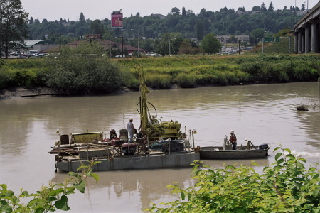 Bardge drilling on the Puyallup in Tacoma.