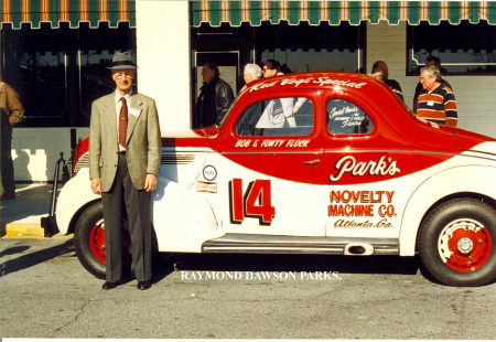 Raymond with one of his race cars.