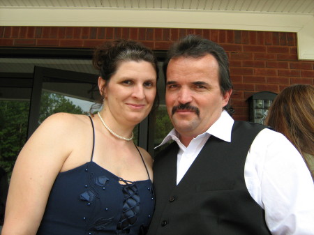 My handsome hubby and I at our daughters weddi