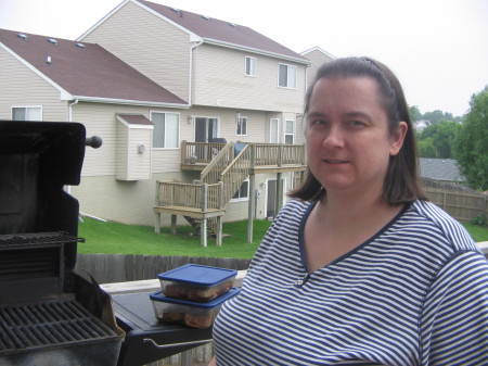 Chris is grilling out