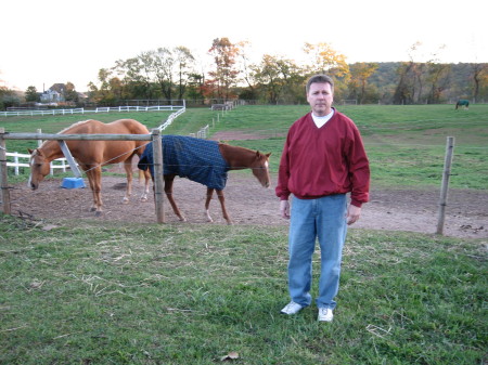 Joe at the farm with our horses