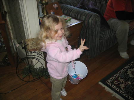 Madeline counting her Easter eggs