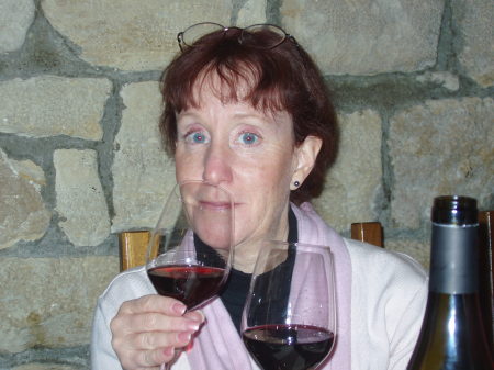 Susan enjoying wine in Paris
