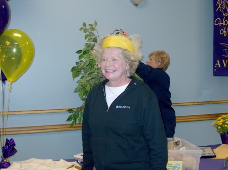 Nancy Cullars trying on a hat from the 60's