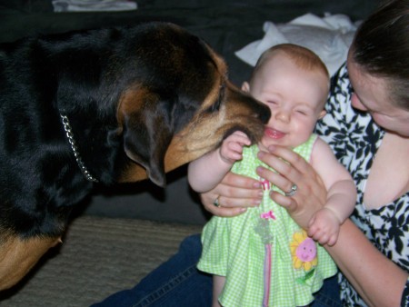 My dog Jasmine loving my granddaughter Cailinn