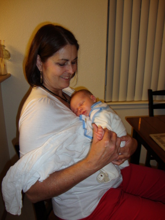 Me holding Roman at 4 weeks old