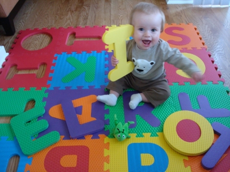 Eliot learning to spell his name at 7 mos