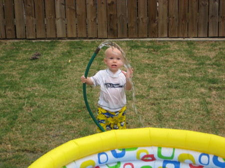 Charlie's fascination with the hose.