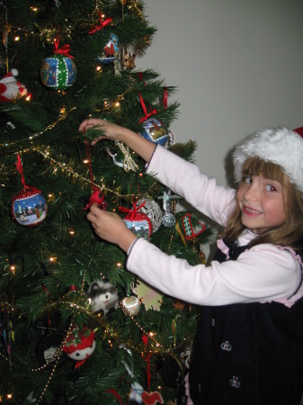 Rachael decorating the Christmas tree