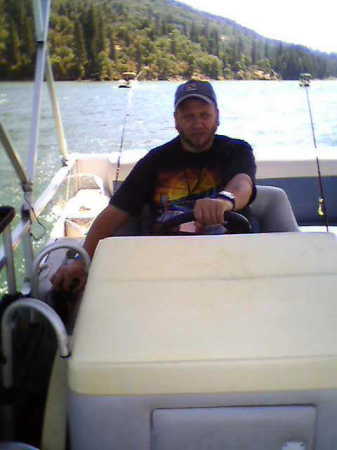 driving a boat at bass lake
