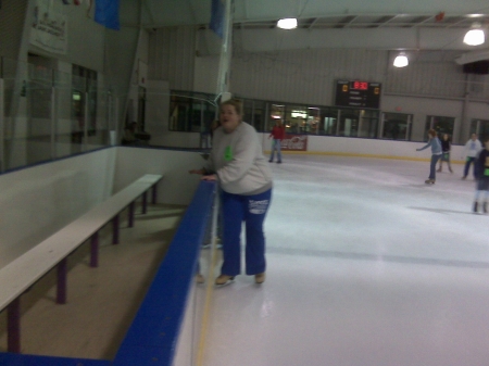 Maddie ice skating with Megan