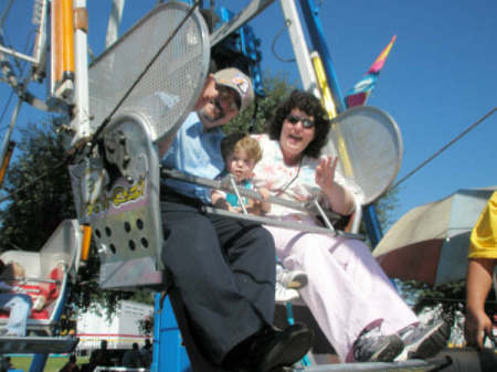 Dan, Melissa and their son Keith on the Ferris