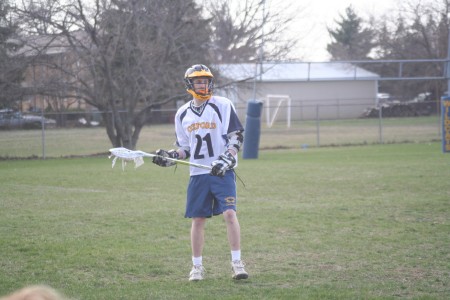 Austin playing Lacrosse