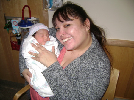 My Grandma Teri's Sister Lanell is holding me.