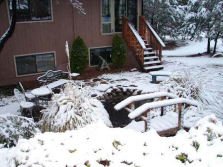 East side of house covered in snow